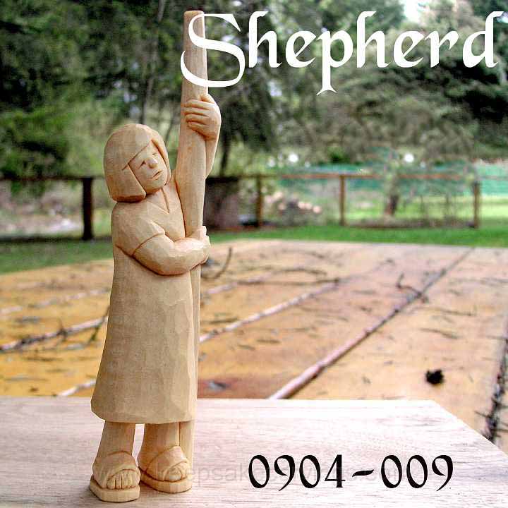 wood carving shepherd standing with crook